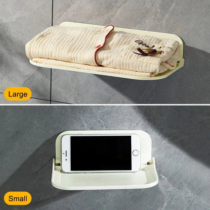 Plataforma de parede dobrável Banheiro sem punção de parede sem parede Phone Phone Phone Jóias controle remoto Rack de roupas de toalha de toalha